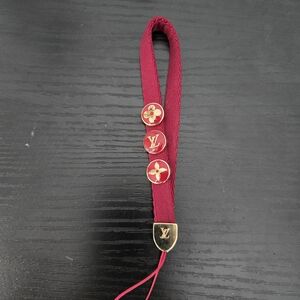 Louis Vuitton Red Key Holder with Gold Accents
